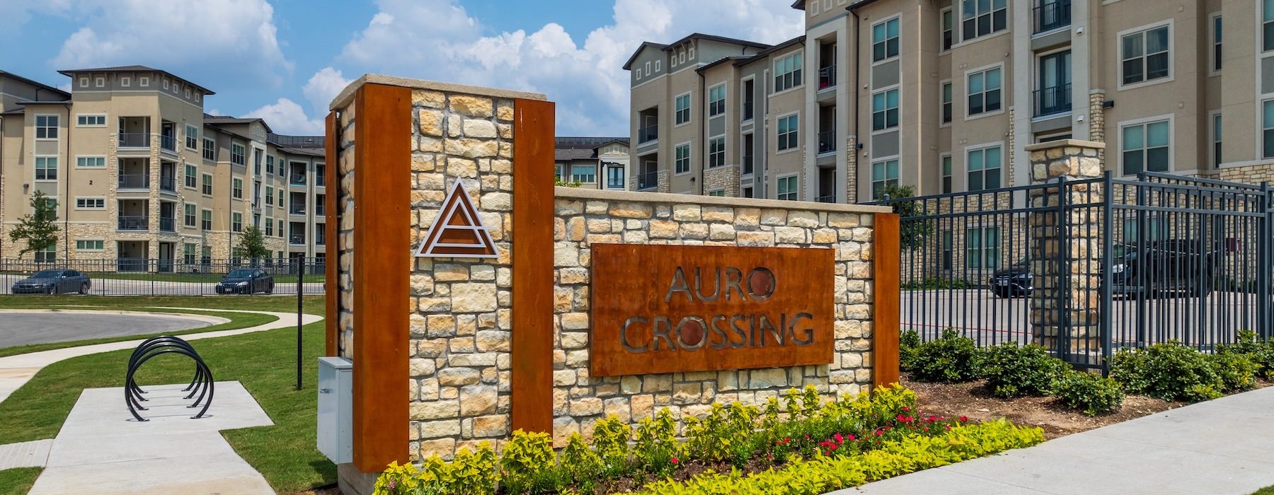 a sign in front of a building